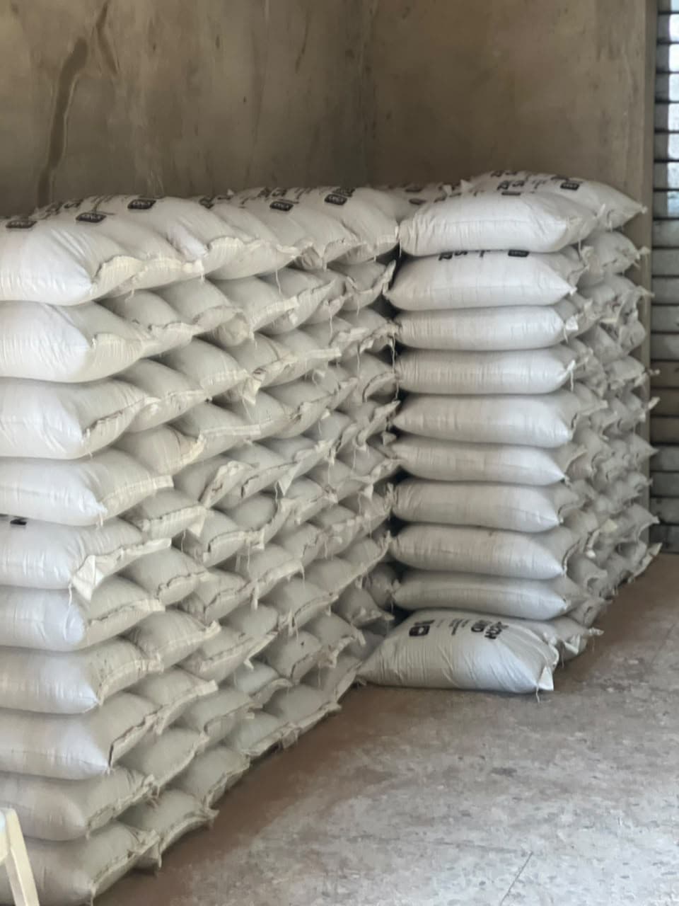 Stacked bags of finished product filling the store